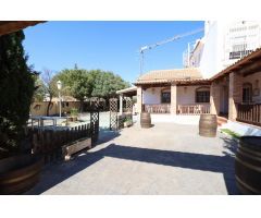 OPORTUNIDAD ÚNICA EN LA ZENIA: VIVIENDA CON NEGOCIO Y AMPLIA PARCELA