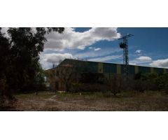 NAVE INDUSTRIAL Y TERRENO EN PUERTO LUMBRERAS.