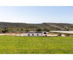 Terreno con casa en entorno de ensueño