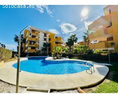 Apartamento de 2 dormitorios en Punta Prima a 200 metros de la playa con piscina comunitaria