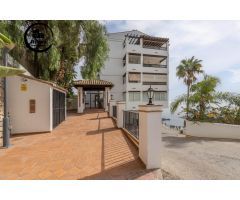 Exclusivo ático en Marina del Este con terraza de 100 m2, garaje, piscina y vistas al mar