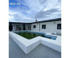 Chalet reformado con piscina y trastero