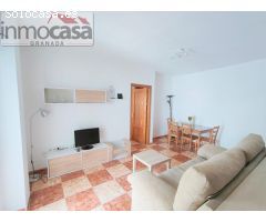 590  euros,  piso de dos dormitorios,  amueblado, con balcon.