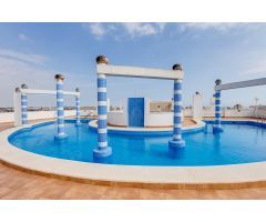 Apartamento de dos dormitorios en residencial con piscina