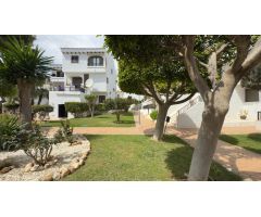 Bungalow en planta baja de 1 dormitorio en urbanización cerrada en pleno corazón de Playa Flamenca
