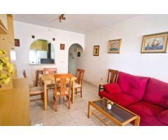 ¡Apartamento (63 m²) con gran terraza acristalada en urbanización cerrada con jardín y gran piscina!