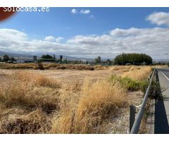 Terreno rústico en la entrada de Huétor Vega: Inversión con vistas a Granada.