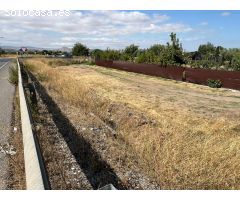 Terreno rústico en la entrada de Huétor Vega: Inversión con vistas a Granada.