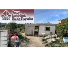 TERRENO RUSTICO EN LA NUCIA CON CASA DE APEROS