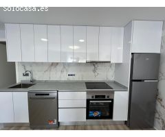 REFORMADO APARTAMENTO CON GARAJE+PISCINA EN PLANTA BAJA CON PARCELA DE 80 M2.