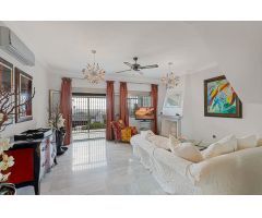 Exclusiva casa adosada con vistas al golf y al mar en Mijas Golf