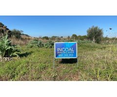 Parcela rústica de 11,319 m² cerca de Albaida con agua de riego y vistas a la montaña