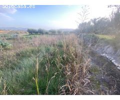 Parcela rústica de 11,319 m² cerca de Albaida con agua de riego y vistas a la montaña