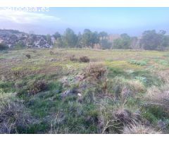 Parcela rústica de 11,319 m² cerca de Albaida con agua de riego y vistas a la montaña