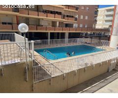 Apartamento en la playa de Daimuz con piscina y garaje privado