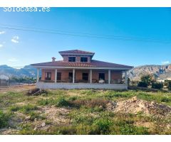 TERRENO CON OBRA INICIADA