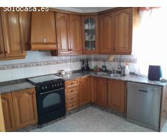 VIVIENDA EN BAJO CON COCHERA