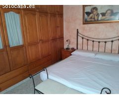 VIVIENDA EN BAJO CON COCHERA