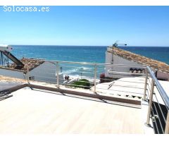 Casa con terraza y vistas al mar