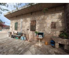 Finca con construcciones para rehabilitar