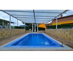 CASA DE PIEDRA CON PISCINA CLIMATIZADA