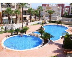 Piso con 2 dorm. y jardin privado de 200 m2 en urbanización cerrada en Guardamar del Segura