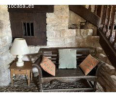 SAGÜES, CASA DE PIEDRA CON TERRENO