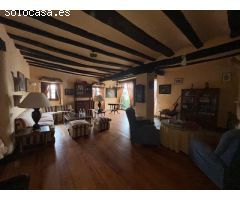 SAGÜES, CASA DE PIEDRA CON TERRENO