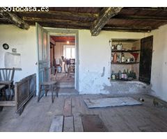 CASA DE PIEDRA CON AMPLIO TERRENO EN ZONA DE CORNANDA, BRION