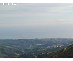 parcela en moclinejo con vistas al mar  con buen acceso