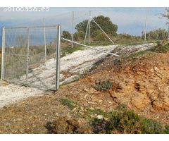 parcela en moclinejo con vistas al mar  con buen acceso