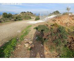 parcela en moclinejo con vistas al mar  con buen acceso