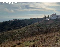 parcela en moclinejo con vistas al mar  con buen acceso