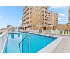 Apartamento esquina de 2 Dorm en Urb con piscina y terraza de ancho especial con vistas al mar