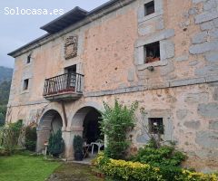 CASA DE PIEDRA CON TERRENO URBANO EN RIVA DE RUESGA