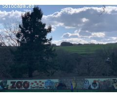TERRENO CON VARIAS EDIFICACIONES
