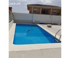 21Inmobiliarias vende parcela con piscina y garaje