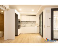 Piso dúplex en planta baja de 3 habitaciones con Patio de Obra Nueva