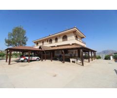 FINCA CON EXPLOTACIÓN AGRÍCOLA