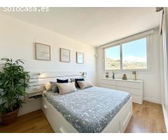 Bajo con terraza y vistas al mar en urbanización privada con piscina