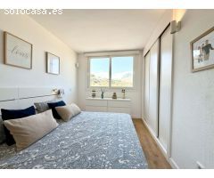 Bajo con terraza y vistas al mar en urbanización privada con piscina