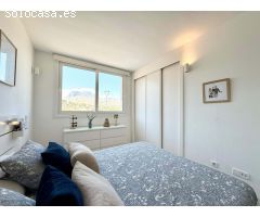 Bajo con terraza y vistas al mar en urbanización privada con piscina