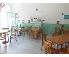 Local comercial actualmente en funcionamiento como cafetería.