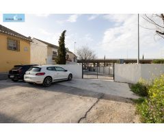 CASA CORTIJO CON PARCELA RÚSTICA DE RIEGO