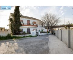 CASA CORTIJO CON PARCELA RÚSTICA DE RIEGO