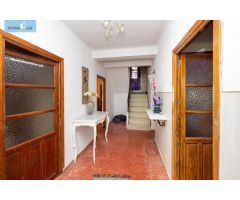 CASA CORTIJO CON PARCELA RÚSTICA DE RIEGO