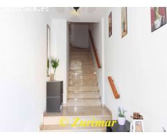Casa con tienda en planta baja