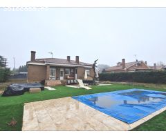 Chalet de una planta con piscina