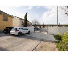 CASA CORTIJO CON PARCELA RÚSTICA DE RIEGO