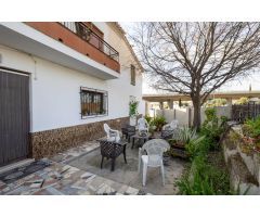 CASA CORTIJO CON PARCELA RÚSTICA DE RIEGO
